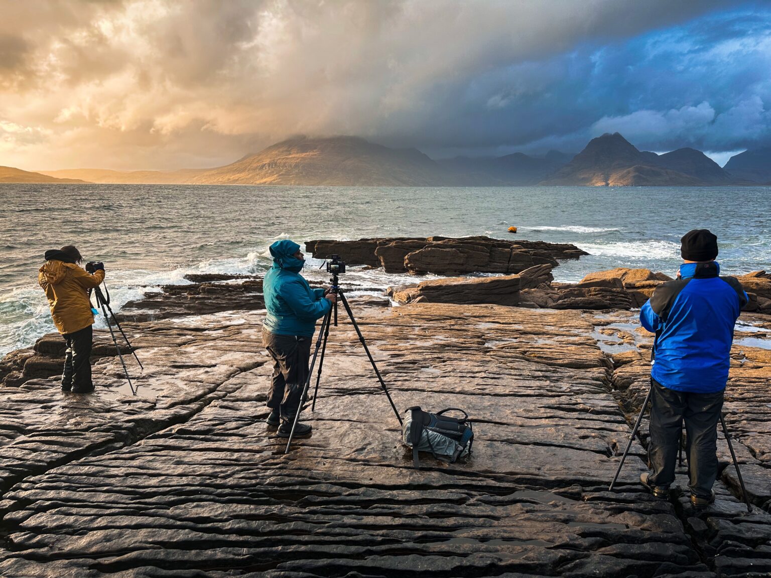 Clients photographing the dramatic light at Elgol on my Isle of Skye Photography Workshop